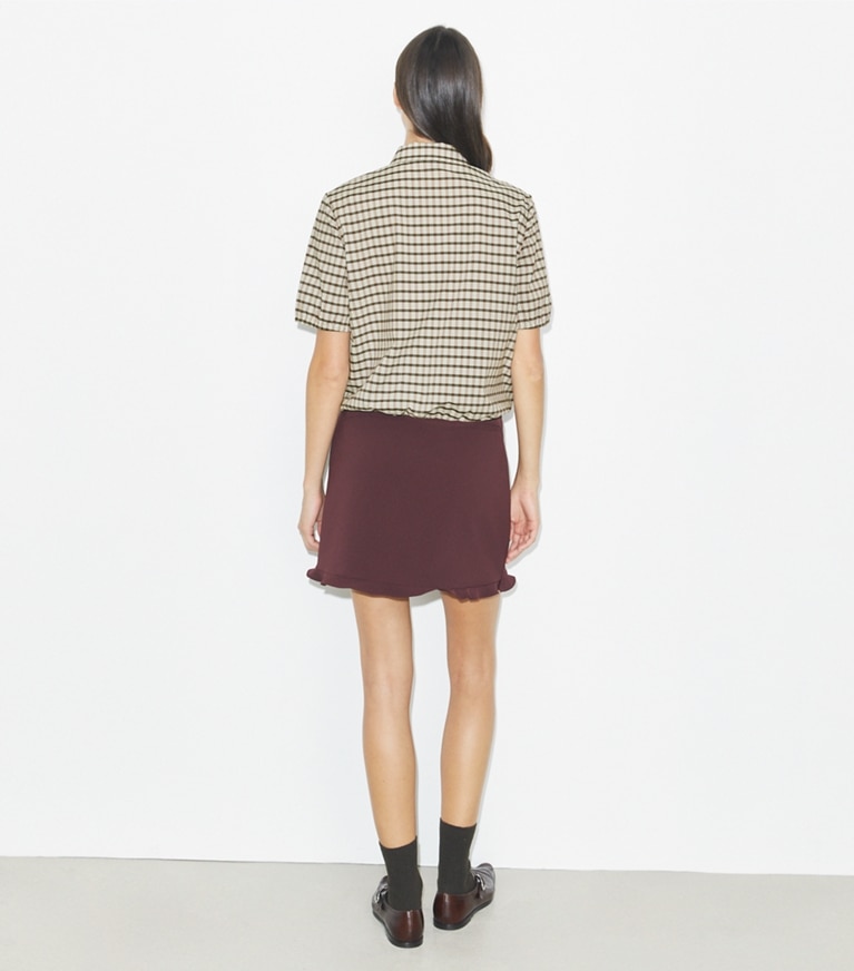 Tory Burch designer bottoms Ruffle Stretch Golf Skirt in Dark Sangria front