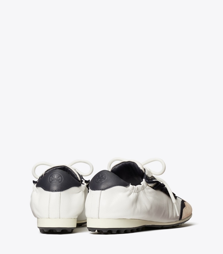 Tory Sport designer sneakers Ruffle Tory Golf Sneaker in Snow White / PERFECT NAVY back