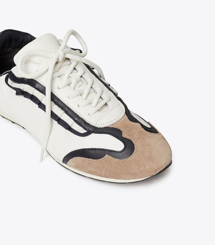 Tory Sport designer sneakers Ruffle Tory Golf Sneaker in Snow White / PERFECT NAVY detail