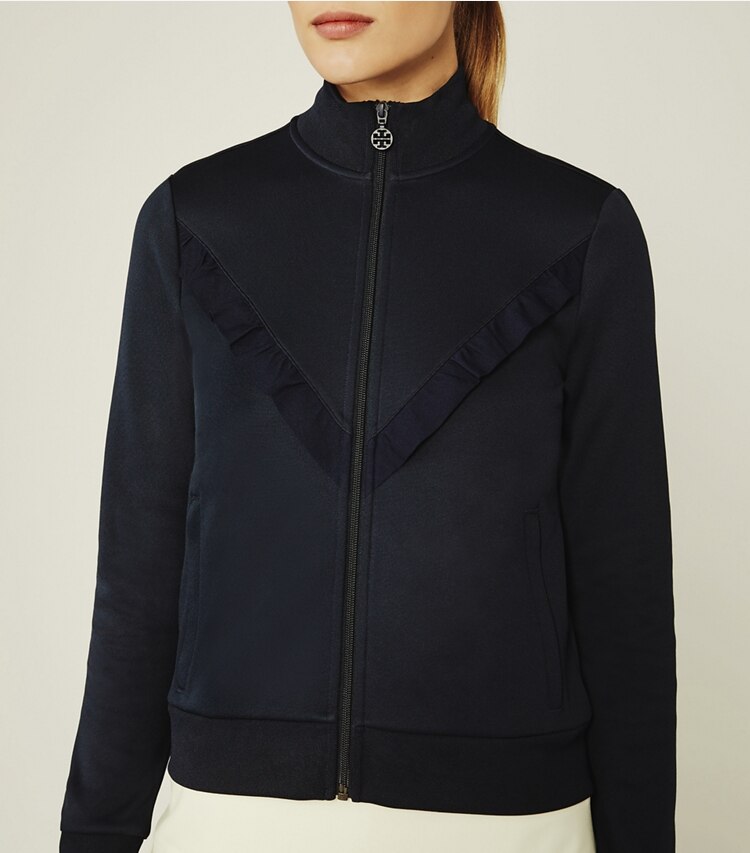 Tory Sport designer jackets Ruffle Track Jacket in Tory Navy on model detail