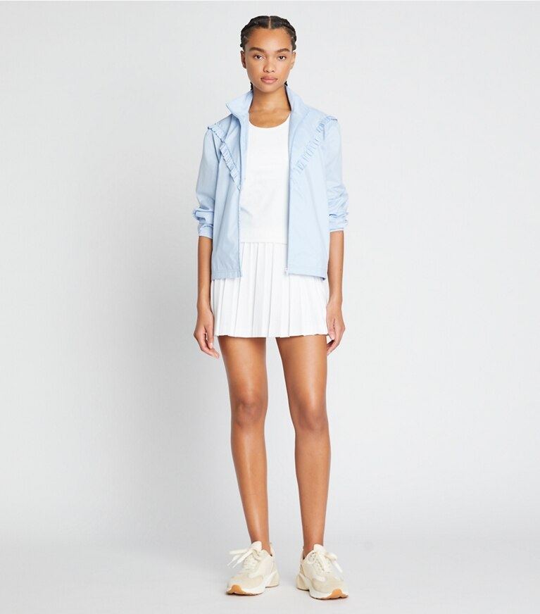 Tory Sport designer jackets Ruffle Windbreaker in Ice Flow front