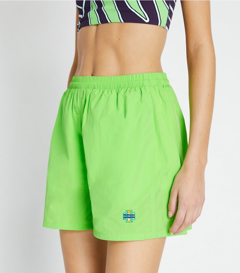 Tory Sport designer bottoms Runner's Camp Short in Vibrant Green front