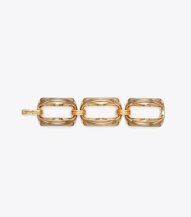 Tory Burch designer bracelets Runway Carved Metal Bracelet in Light Brass detail