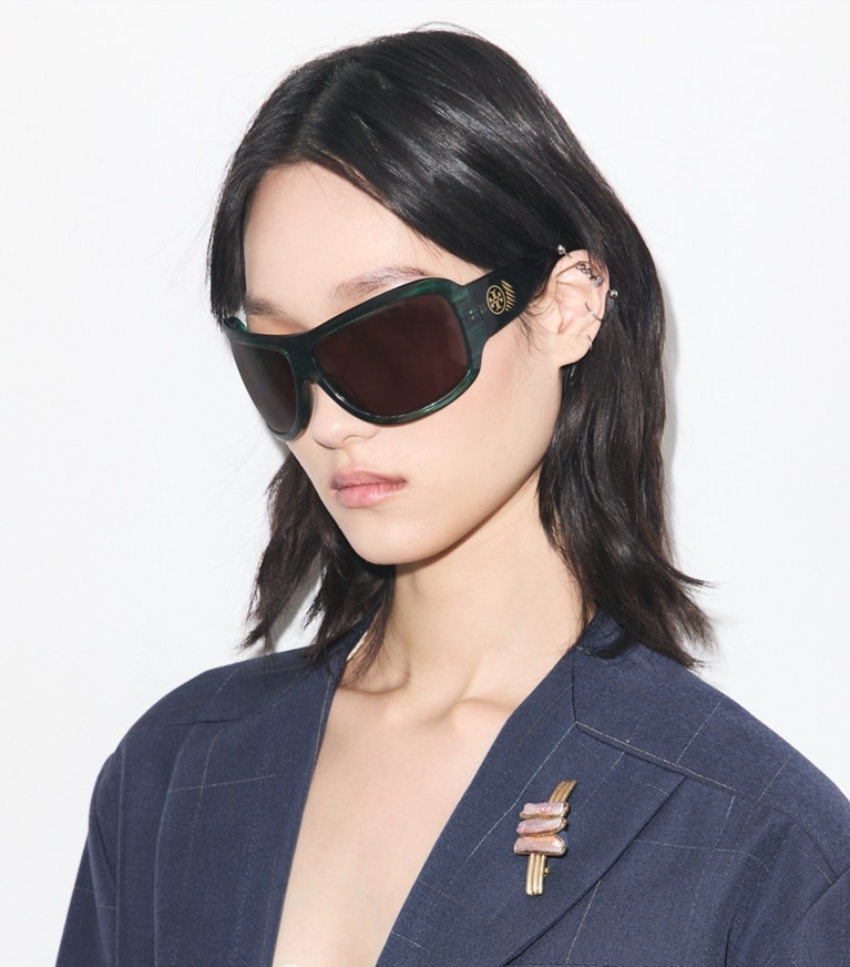 Tory Burch designer sunglasses & eyewear Runway Wrap Sunglasses in STRIATED GREEN/BROWN accessory on model