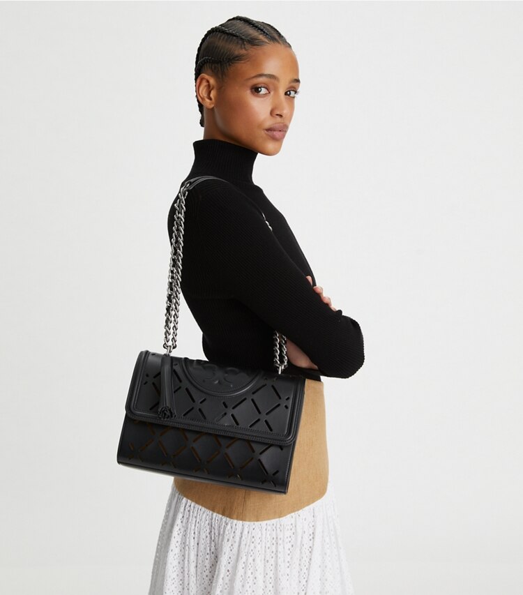 Tory Burch designer sacs porté épaule Sac à bandoulière convertible Fleming à motif diamant perforé dans Black accessoire sur le modèle