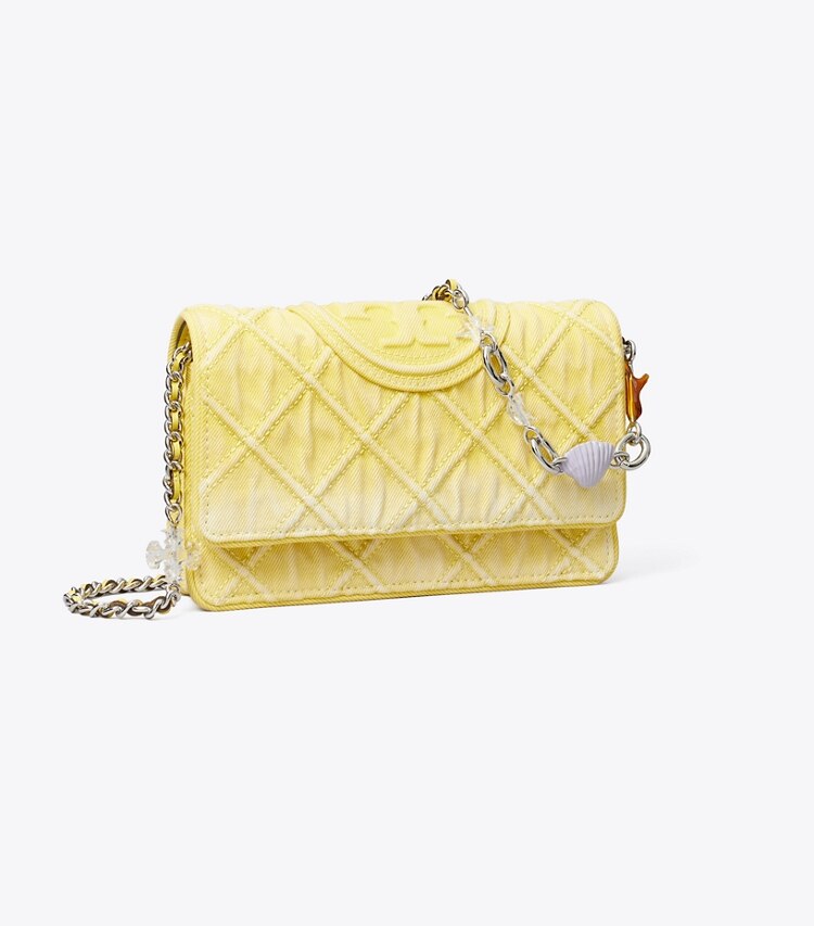Tory Burch designer sacs à bandoulière Sac à bandoulière Fleming en denim avec breloque et chaîne dans Yellow angle