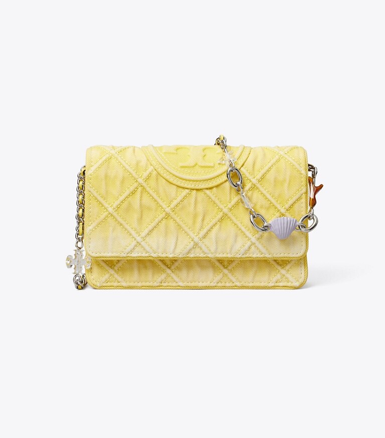 Tory Burch designer sacs à bandoulière Sac à bandoulière Fleming en denim avec breloque et chaîne dans Yellow de face