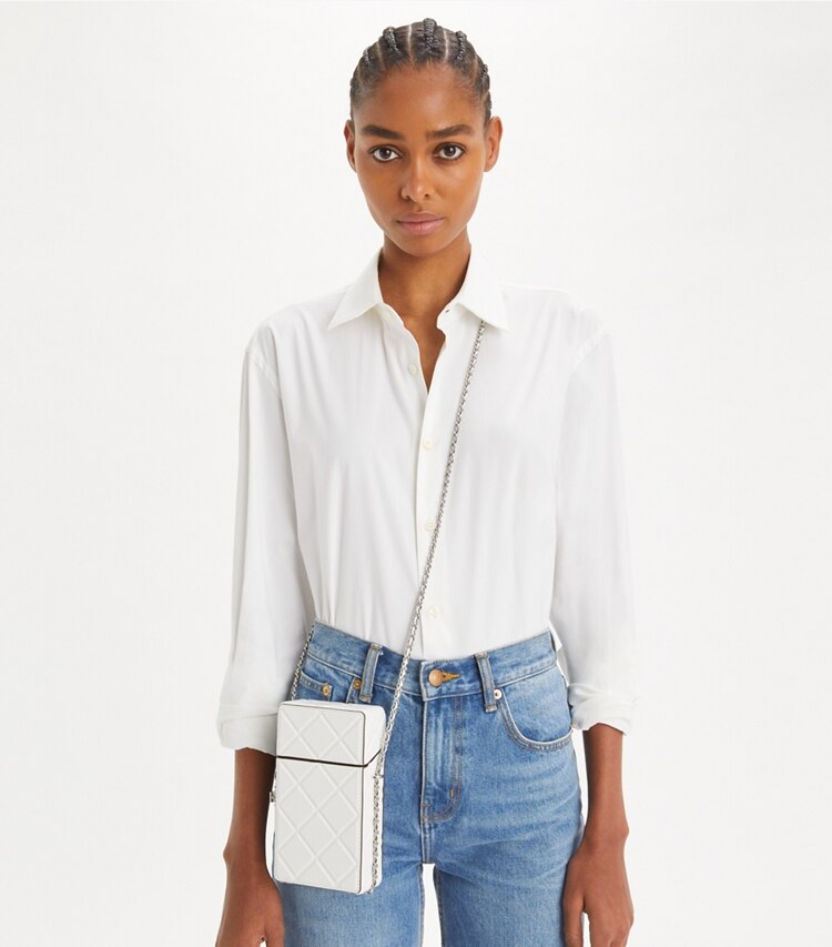 Tory Burch designer mini sacs Sac à bandoulière pour téléphone Fleming dans Blanc accessoire sur le modèle
