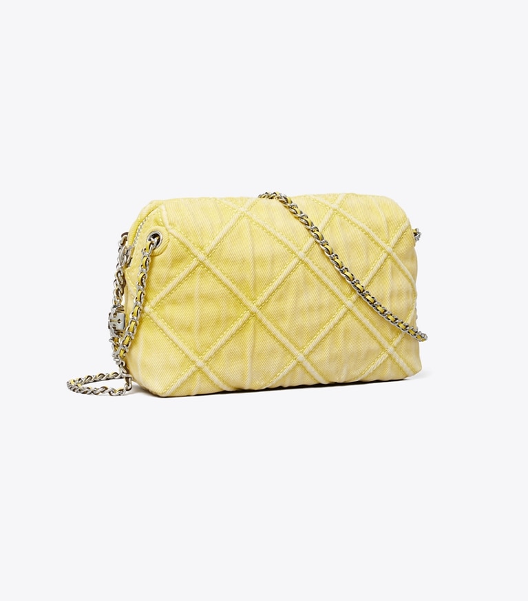 Tory Burch designer sacs à bandoulière Sac bandoulière souple Fleming en denim dans Yellow angle