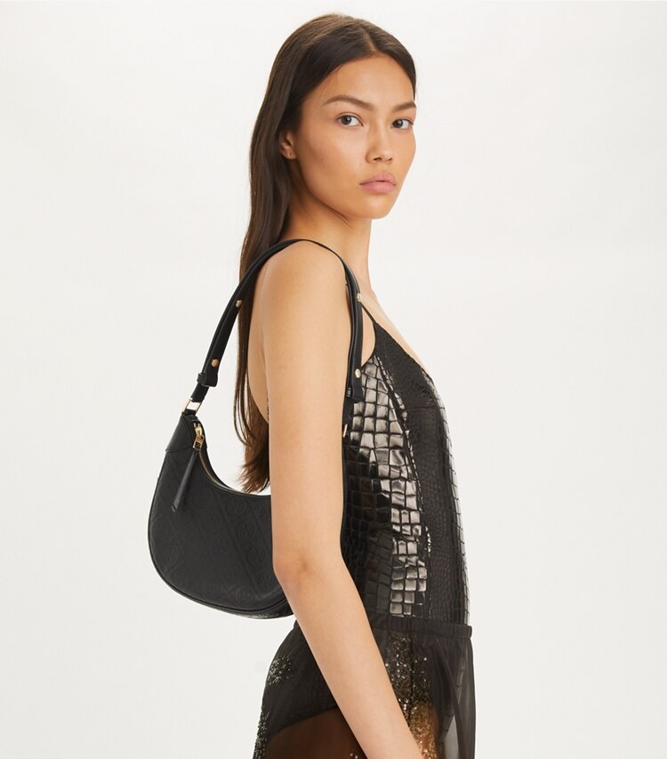 Tory Burch designer sacs porté épaule Sac croissant T Monogram en cuir in Black accessory on model