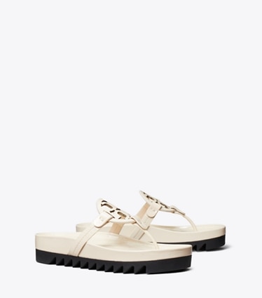Tory Burch designer sandales Sandale Miller Cloud Lug dans NEW CREAM / PERFECT BLACK angle