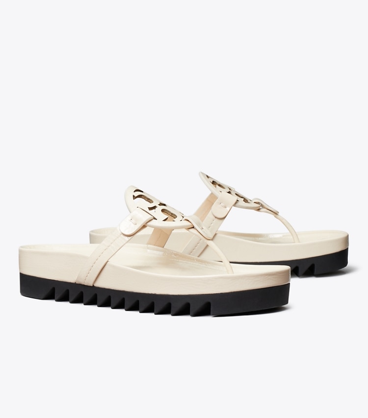 Tory Burch designer sandales Sandale Miller Cloud Lug dans NEW CREAM / PERFECT BLACK angle