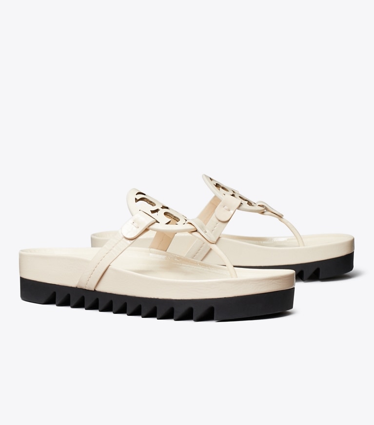 Tory Burch designer sandales Sandale Miller Cloud Lug dans NEW CREAM / PERFECT BLACK angle