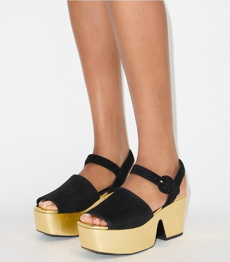 Tory Burch designer sandales Sandales à plateforme in PERFECT BLACK / CHAMPAGNE accessory on model