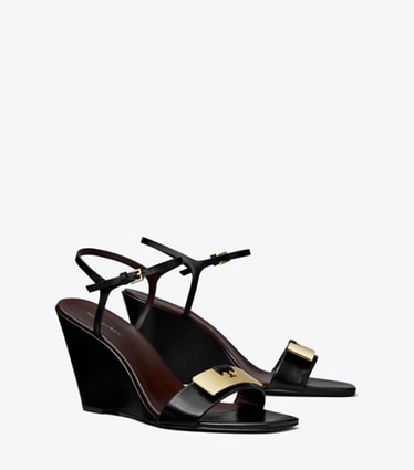 Tory Burch designer sandales Sandales à talon compensé Gigi in PERFECT BLACK / GOLD angle