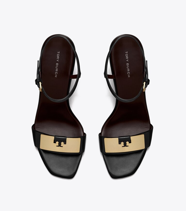 Tory Burch designer sandales Sandales à talon compensé Gigi in PERFECT BLACK / GOLD angle