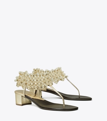 Tory Burch diseñador sandalias Sandalia con tacón y cuentas en Spark Gold ángulo
