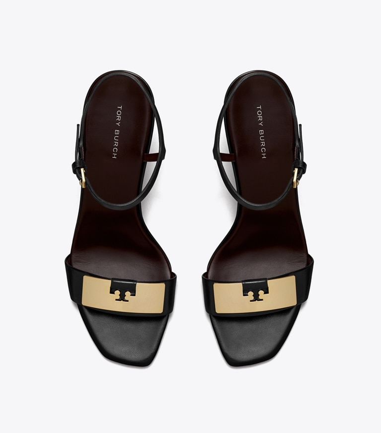 Tory Burch designer sandali Sandalo con zeppa Gigi in PERFECT BLACK / GOLD angle