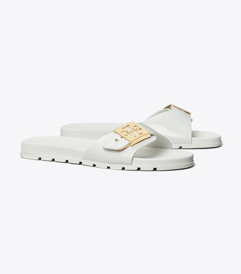 Tory Burch designer sandali Sandalo slider con fibbia in WHITE / GOLD angle