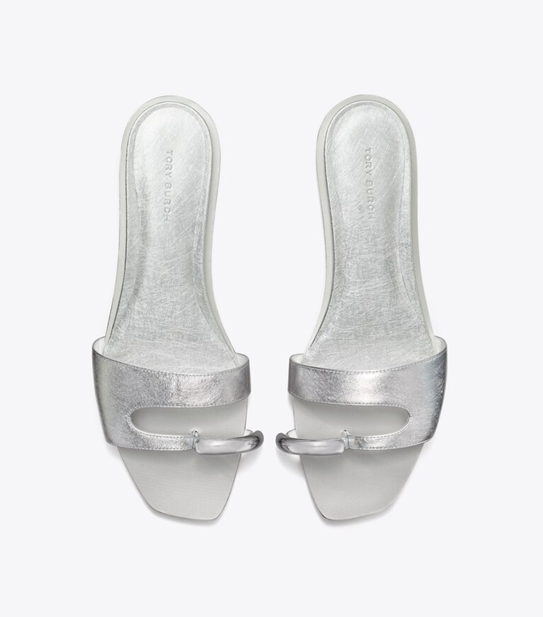Tory Burch designer sandali Sandalo slider Pierced in BRIGHT SILVER / SILVER angle
