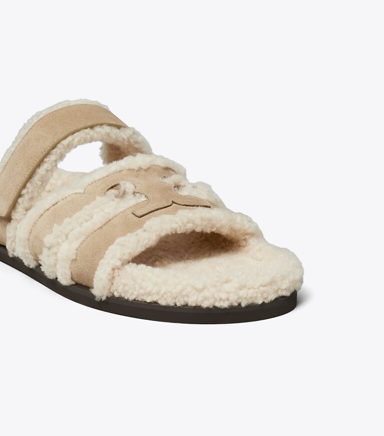 Tory Burch designer sandali Sandalo slider sportivo Ines in shearling in NOISETTE / TAUPE angle