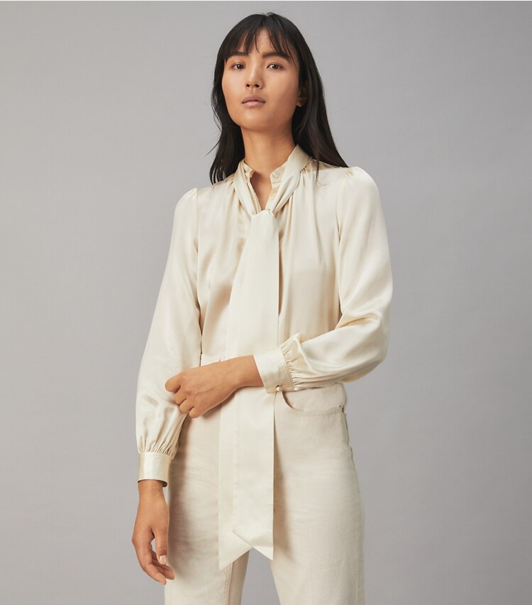 Tory Burch designer tops Satin Bow Blouse in NEW IVORY on model detail