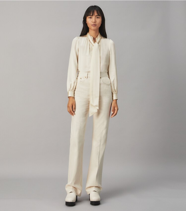 Tory Burch designer tops Satin Bow Blouse in NEW IVORY on model front