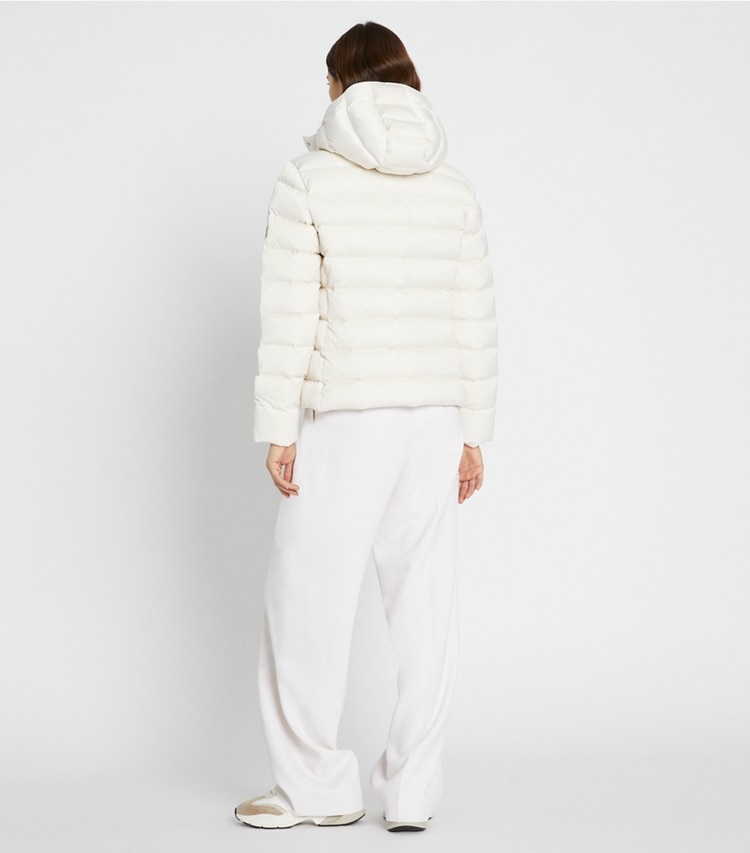Tory Sport designer coats Satin Down Belted Jacket in Ivory Pearl on model back