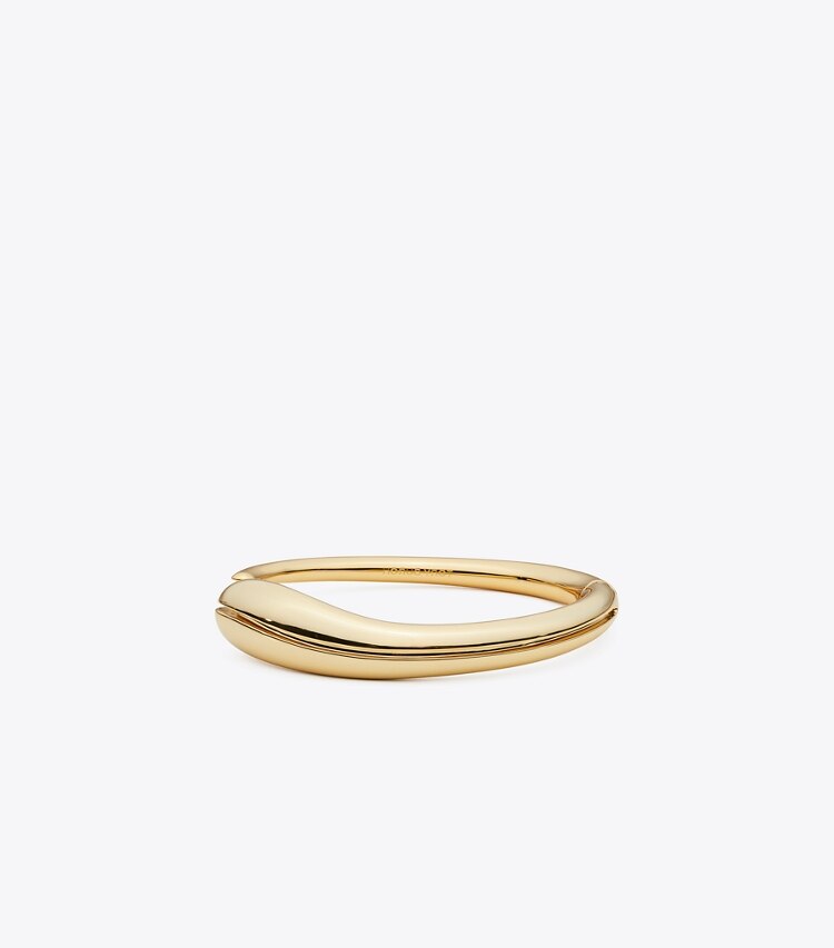 Tory Burch designer armbänder Schmale Armspange mit Piercingdetail in Light Brass front