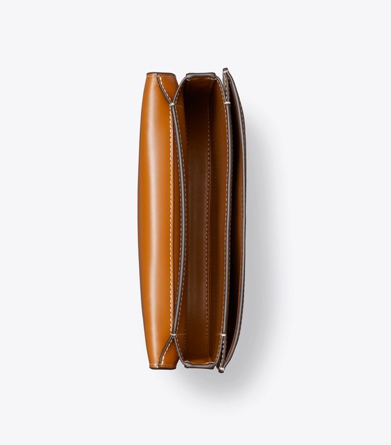 Tory Burch designer schultertaschen Schmale Eleanor Satteltasche in Malt Whiskey angle