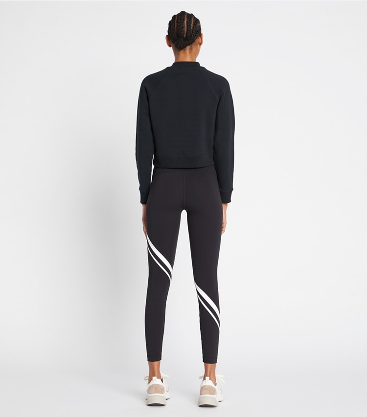 Tory Sport designer bottoms Sculpt Compression Diagonal Chevron Legging in Sport Black on model back