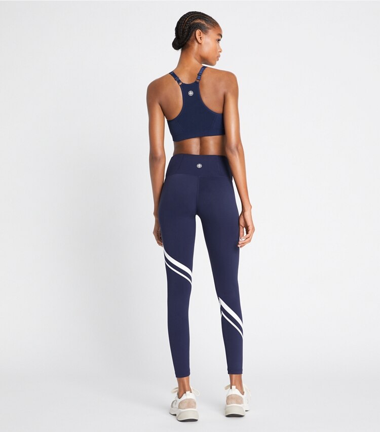 Tory Sport designer bottoms Sculpt Compression Diagonal Chevron Legging in Tory Navy on model back