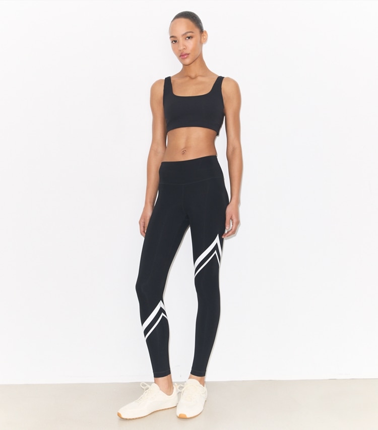 Tory Burch designer bottoms Sculpt Compression Diagonal Chevron Legging in Sport Black on model front