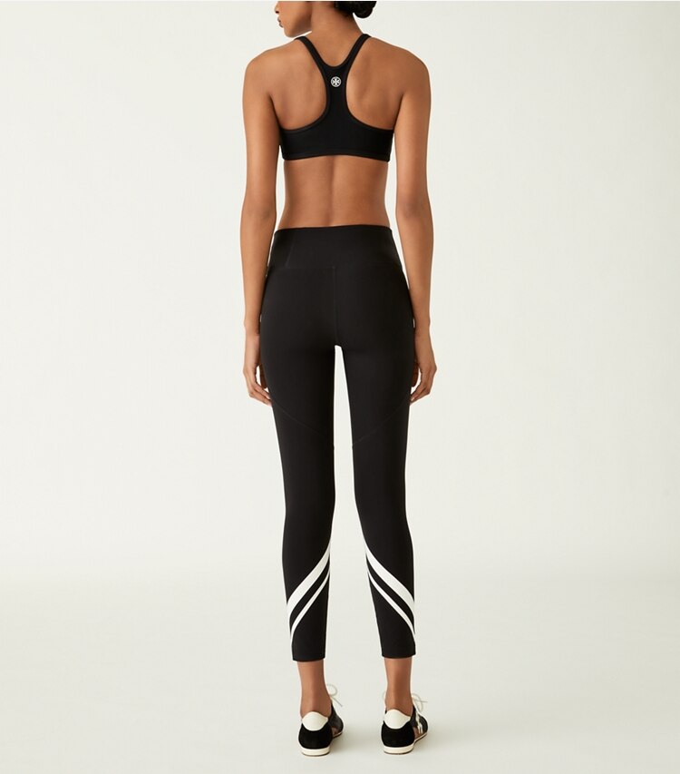 Tory Sport designer sports bras Sculpt Compression Racerback Bra in Sport Black on model back