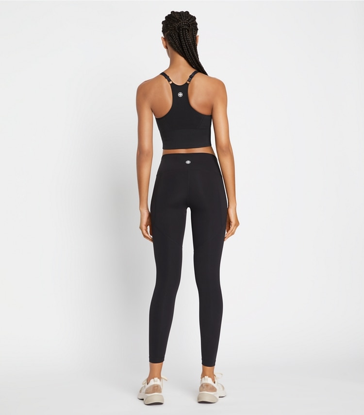 Tory Sport designer bottoms Sculpt Compression Side-Pocket Legging in Sport Black on model back