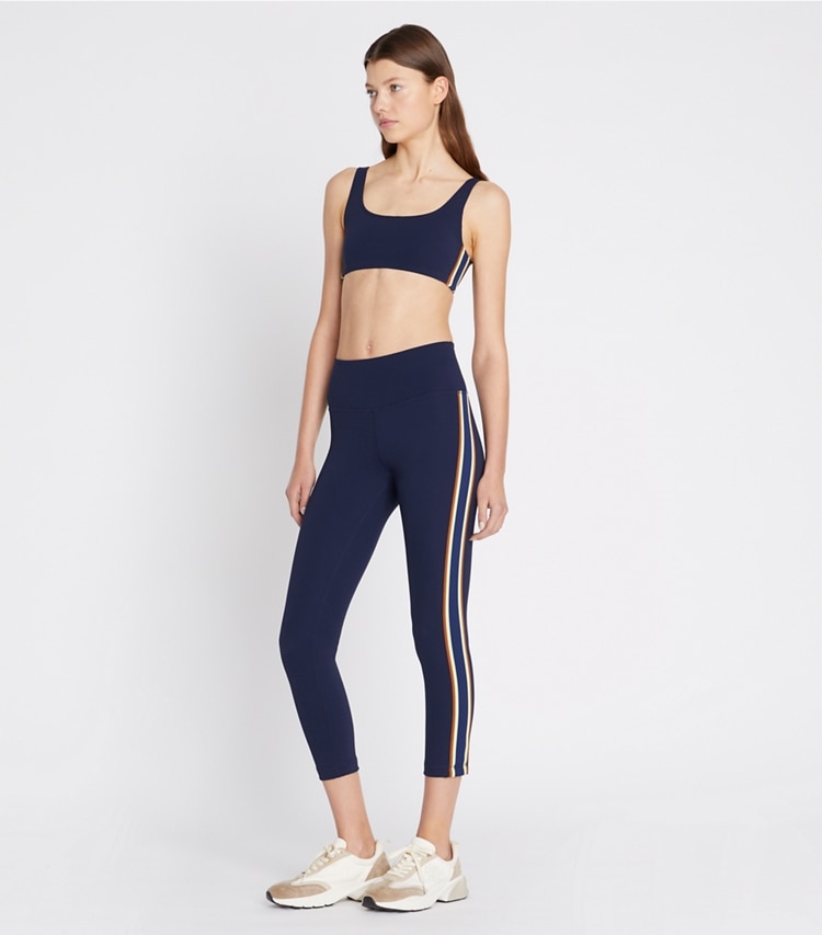 Tory Sport designer sports bras Sculpt Compression Side-Stripe Bra in Tory Navy on model front