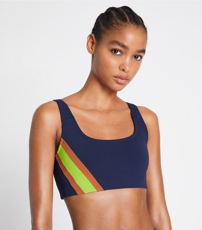 https://s7.toryburch.com/is/image/ToryBurch/style/sculpt-compression-striped-bra-on-model-detail.TB_146197_770_20230119_OMDET.pdp-767x872.jpg