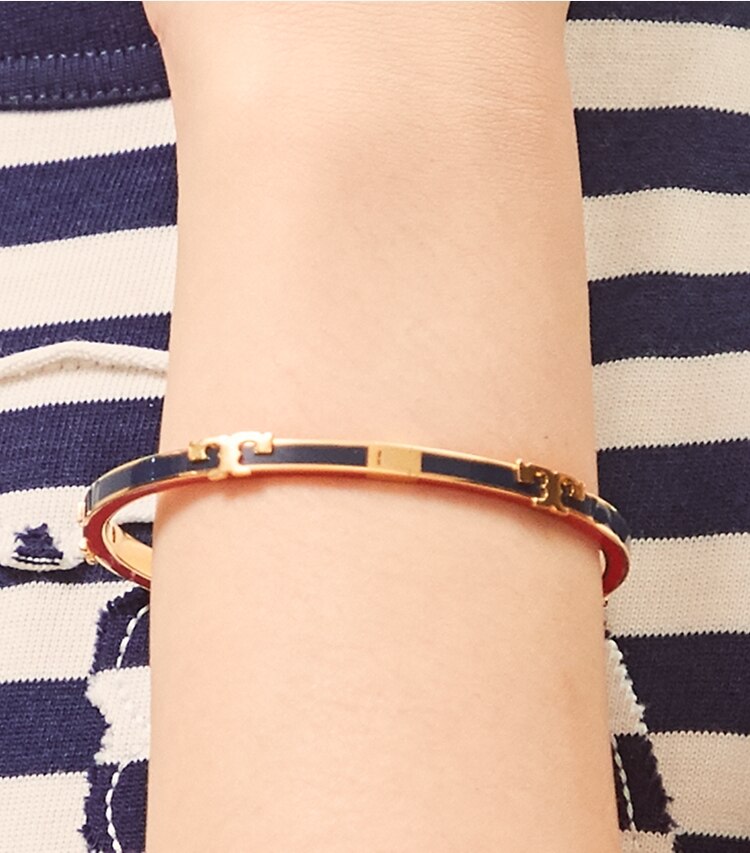 Tory Burch designer bracelets Serif-T Enameled Stackable Bracelet in Tory Gold/Pink City accessory on model