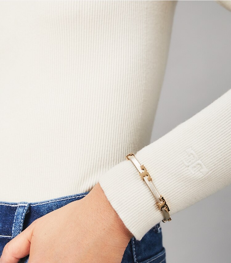 Tory Burch designer bracelets Serif-T Metallic Single-Wrap Bracelet in Tory Gold Metallic accessory on model