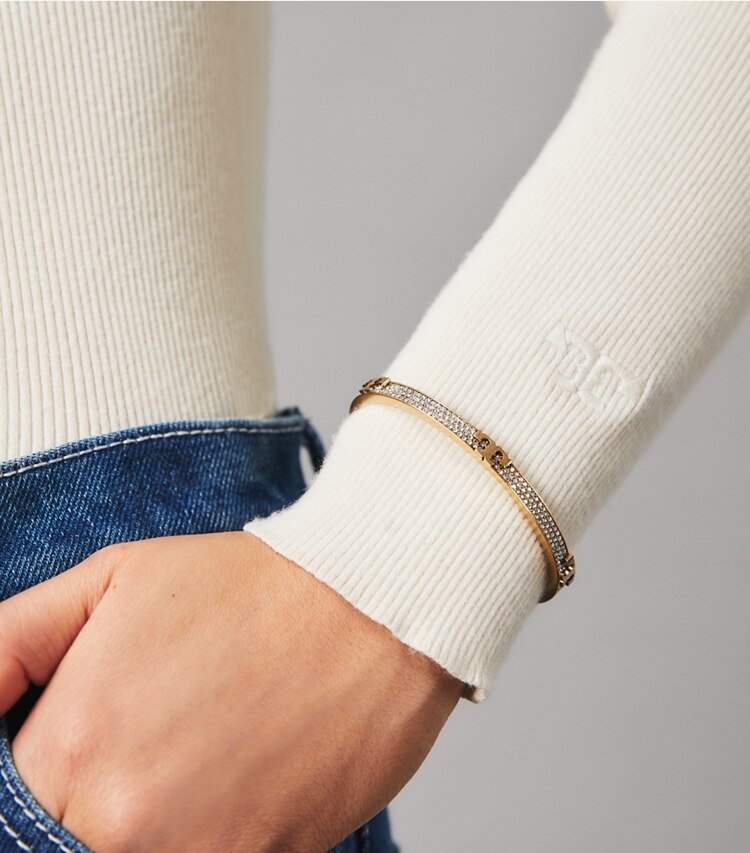 Tory Burch designer bracelets Serif-T Pavé Hinged Bracelet in Brass / Crystal accessory on model