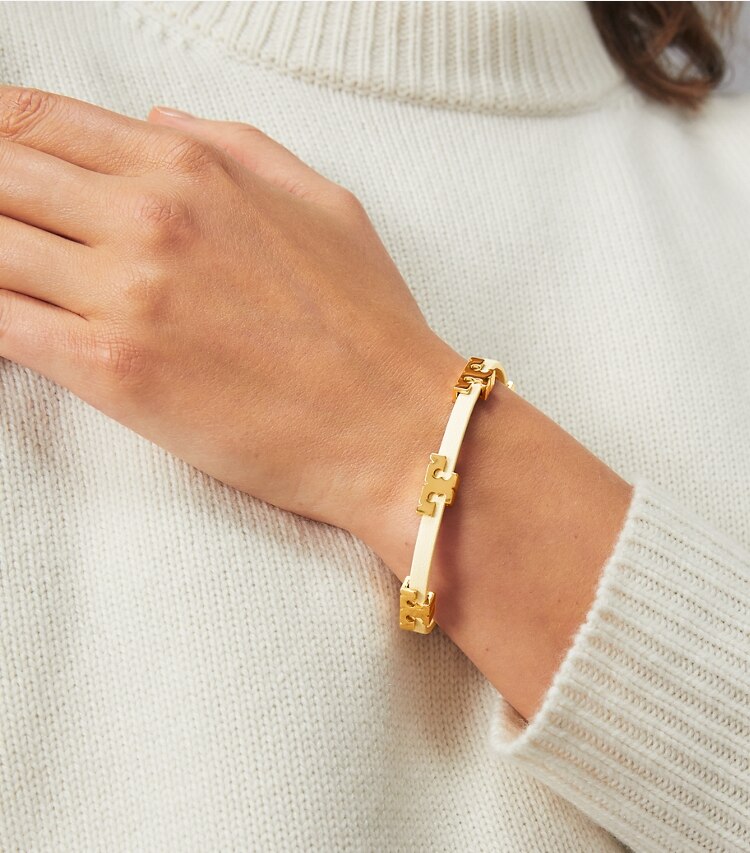 Tory Burch designer bracelets Serif-T Single Wrap Bracelet in Tory Gold/New Ivory accessory on model