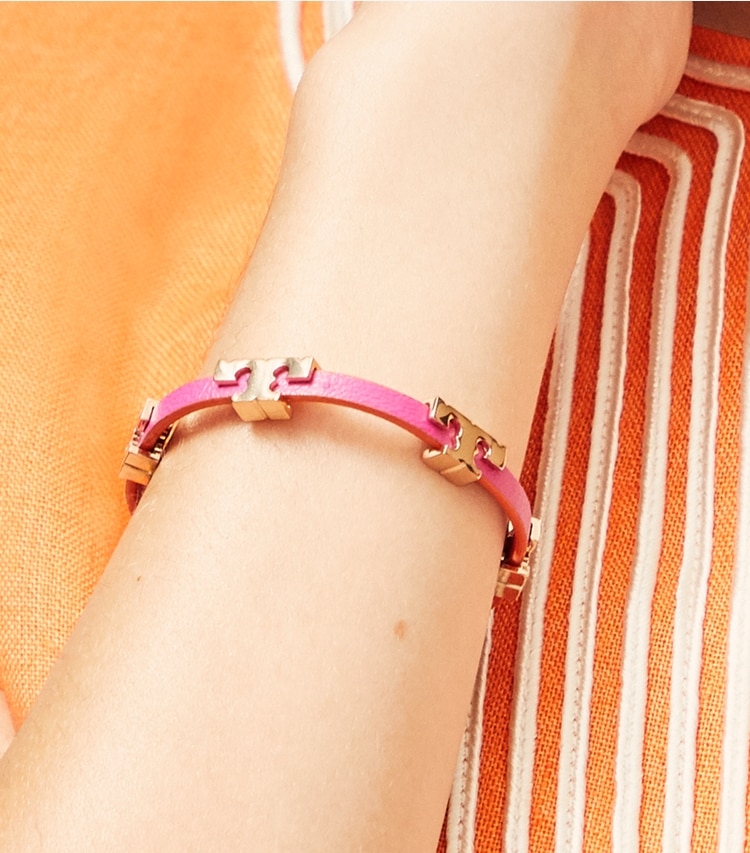 Tory Burch designer bracelets Serif-T Single Wrap Bracelet in Tory Gold/Coconut/Vachetta accessory on model