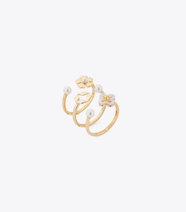 Tory Burch diseñador anillos Set de anillos apilables Forget Me Not en Tory Gold / Mother of Pearl / Cream ángulo