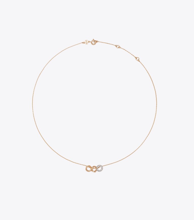 Tory Burch diseñador estuches para joyas Set de regalo de collar y aretes Icon en Tory Gold / Tory Silver / Crystal frente