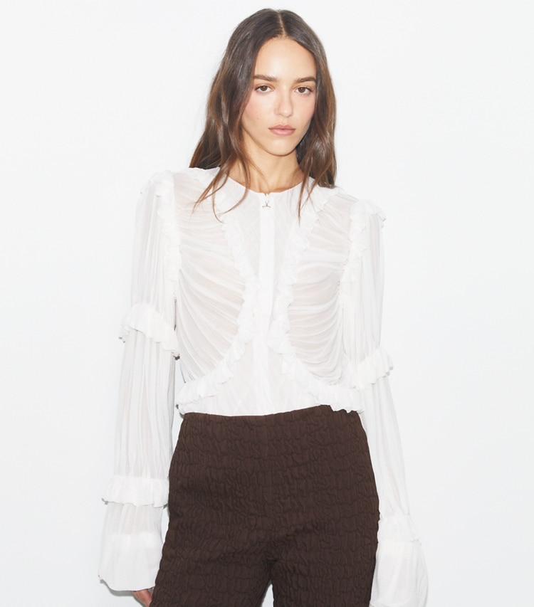 Tory Burch designer tops Sheer Jersey Ruffle Top in Marshmallow on model detail