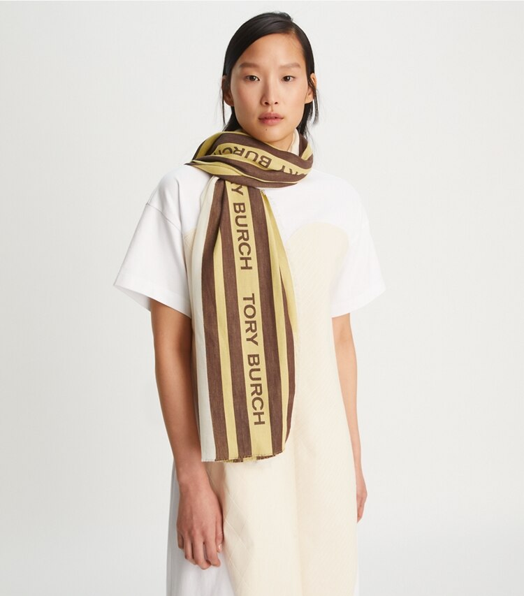 Tory Burch designer scarves Sheer Voyager Oblong Scarf in Sheer French Cream accessory on model