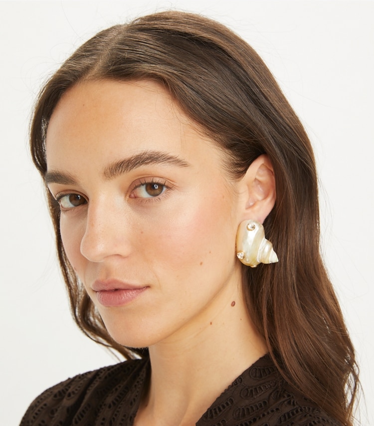 Tory Burch designer earrings Shell Clip-On Earring in Ivory accessory on model