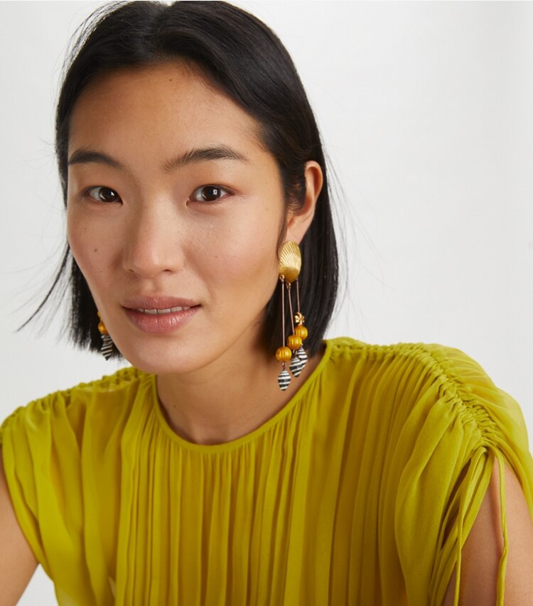 Tory Burch designer earrings Shell Statement Earring in Gold / Multi accessory on model
