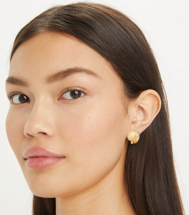 Tory Burch designer earrings Shell Stud Earring in Rolled Light Brass accessory on model