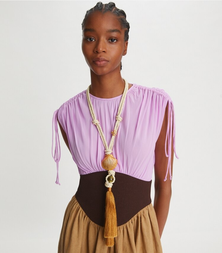 Tory Burch designer necklaces Shell Tassel Pendant Necklace in Rolled Tory Gold / Ivory / Multi accessory on model